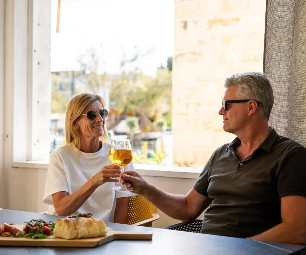 Guests enjoying olive oil tasting in a small group setting