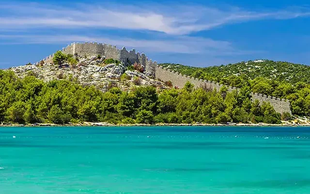 Dalmatian coastline near Šibenik with clear blue sea